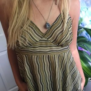 the limited brown flowy tank top